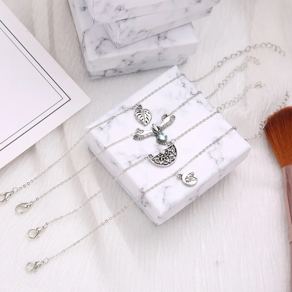 *CALLIOPE* 4-Pc Silver Eagle Fashion Bracelet Set